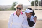 Liz Kaila, Julie Kisio